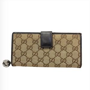Vintage Gucci supreme monogram wallet with charm zipper